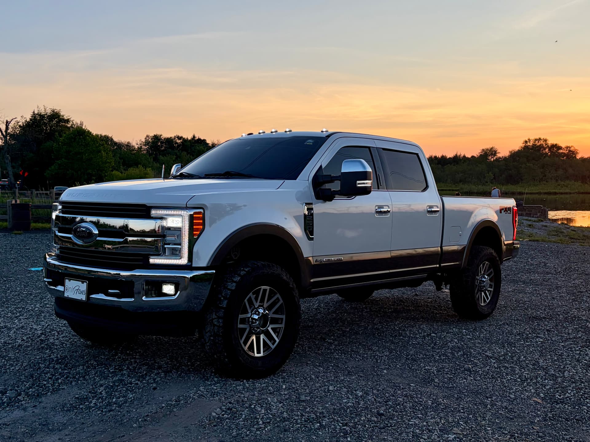 White Ford Super Duty King Ranch after a maintenance wash