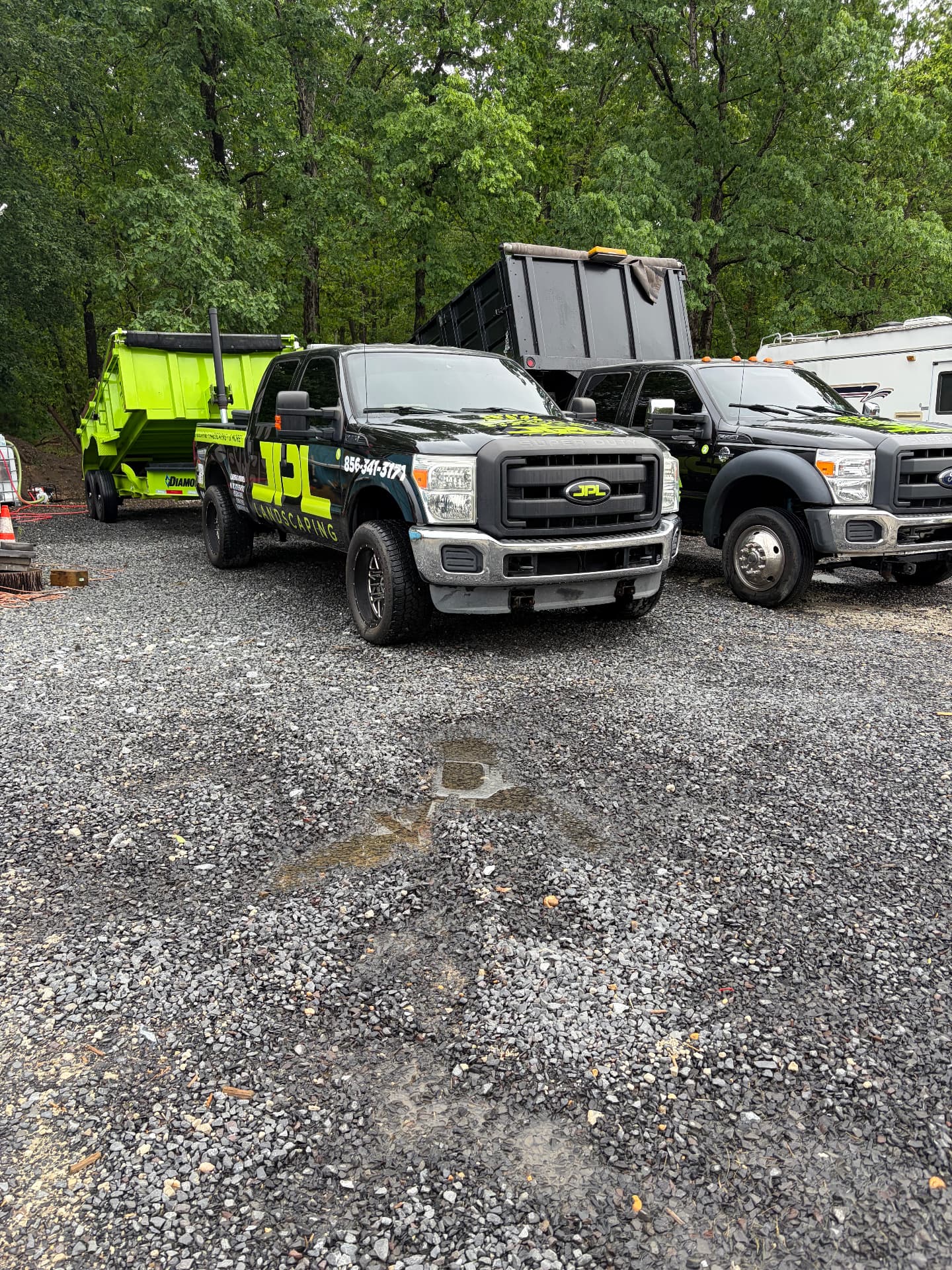 JPL Landscaping wrapped Super Duty trucks cleaned on location
