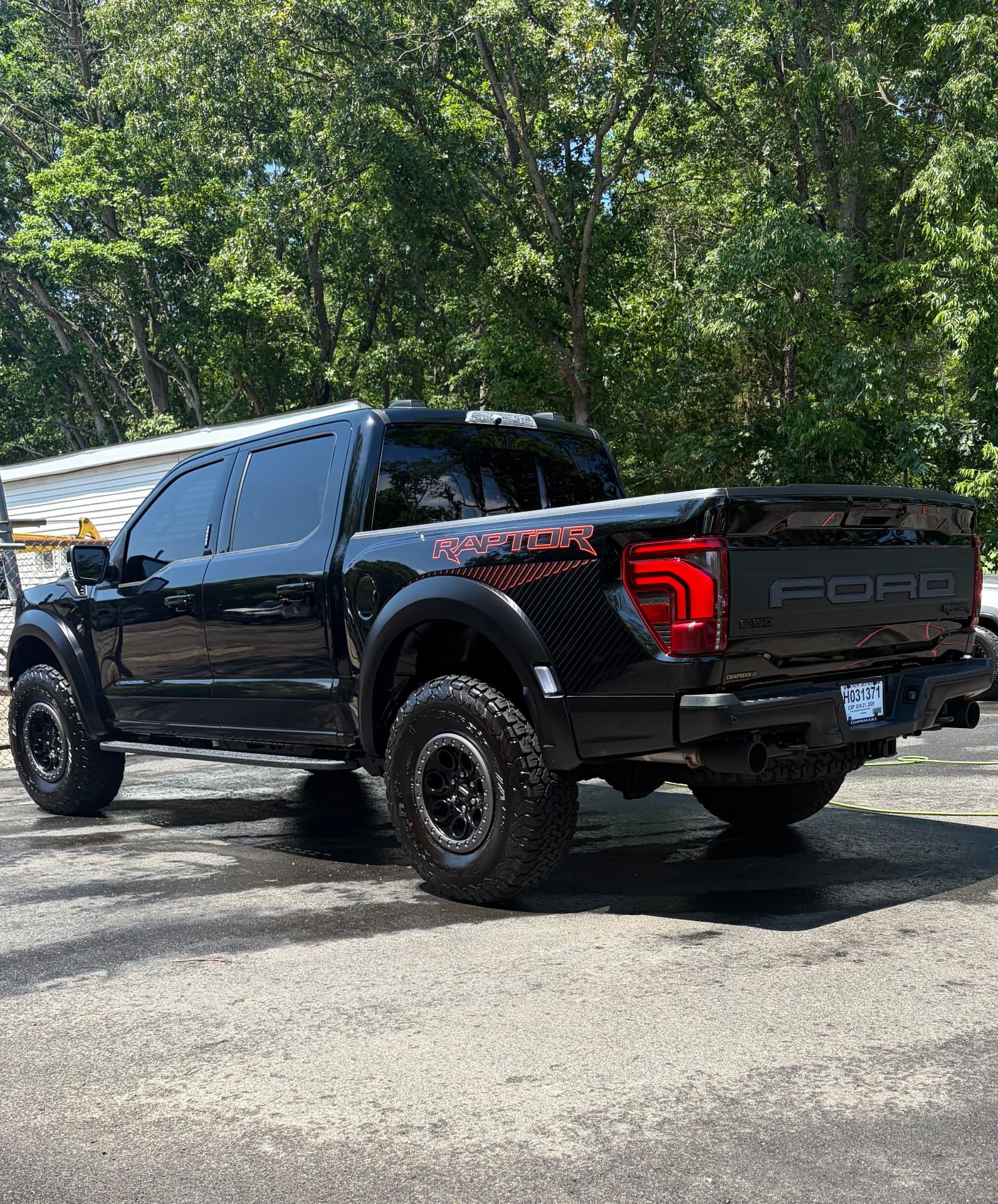 Black Ford F-150 Raptor freshly washed on site