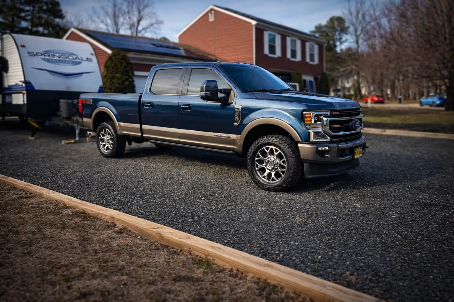 Blue Ford F-250 King Ranch detailed at a client's home